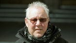 Two paralyzed British men who want to die but cannot kill themselves went to court on Monday seeking protection from prosecution for those who could help them end their lives.